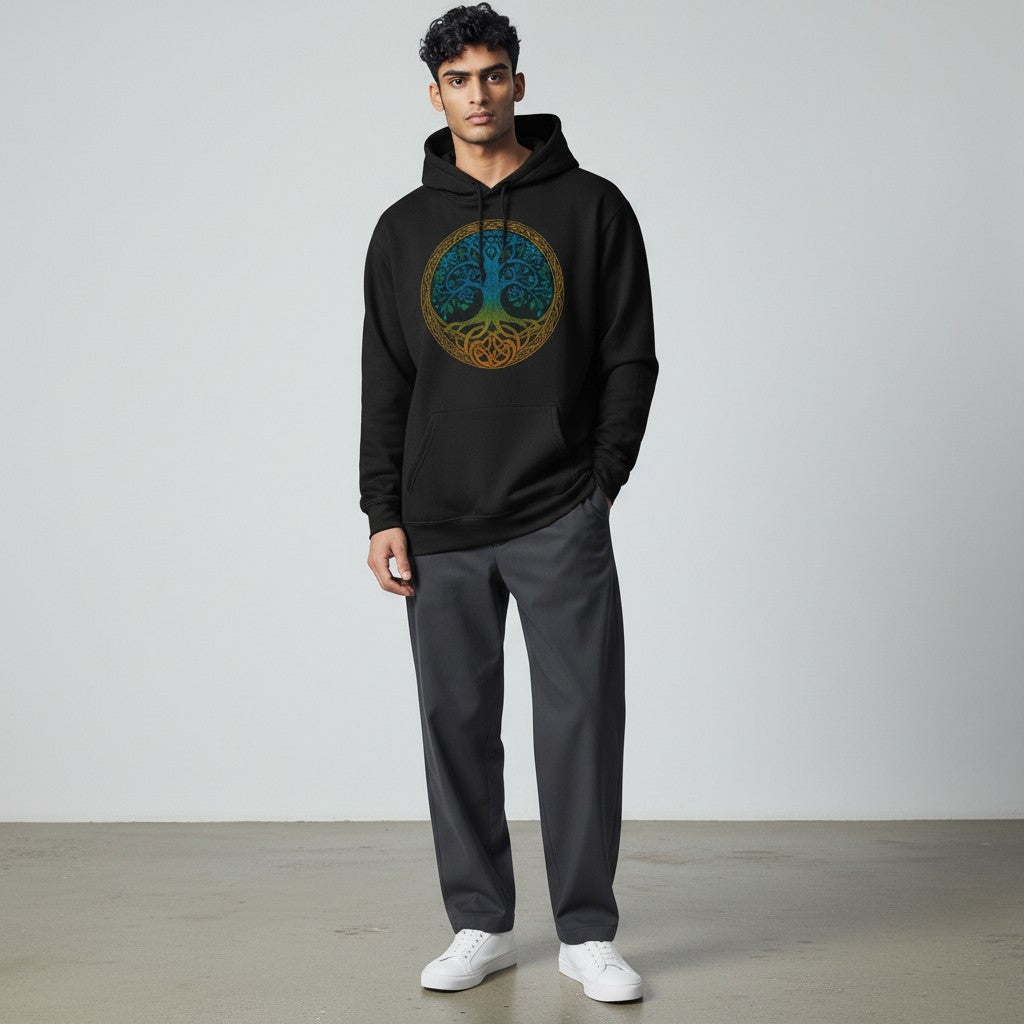 Person wearing a black hoodie with a colorful design, standing against a plain background
