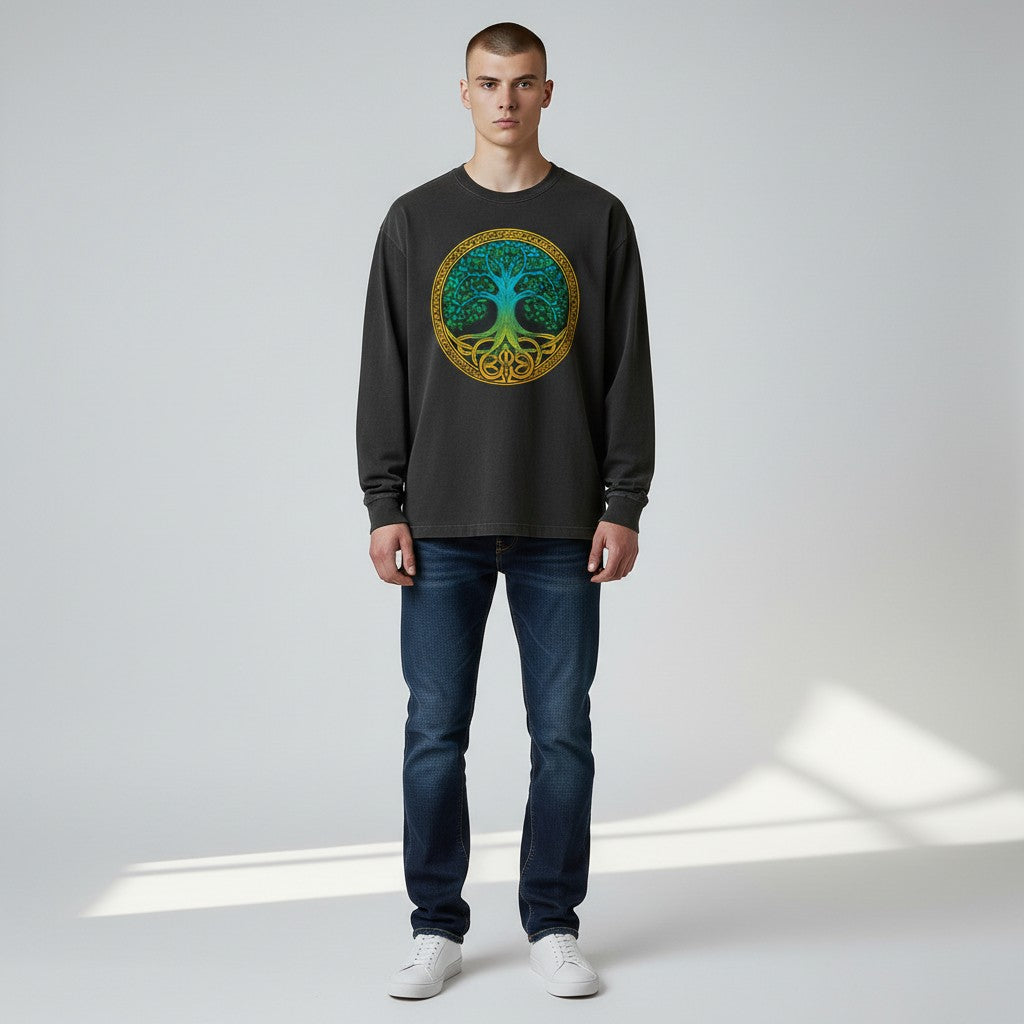 Black Tree of Life Long Sleeve Tee featuring a blue and gold Celtic-inspired Tree of Life graphic on the front on model.