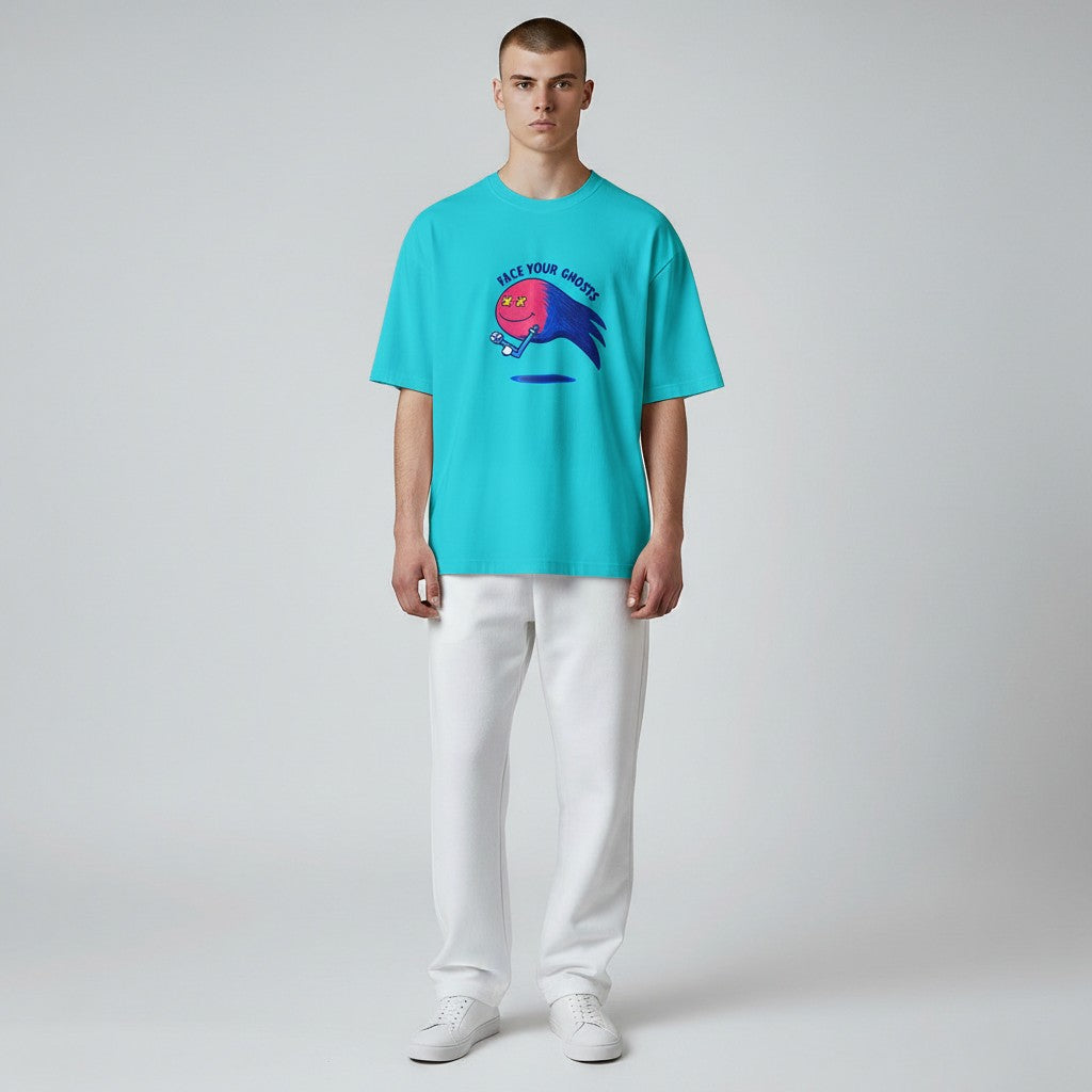 Face Your Ghosts Tee turquoise graphic t-shirt with ghost illustration on male model