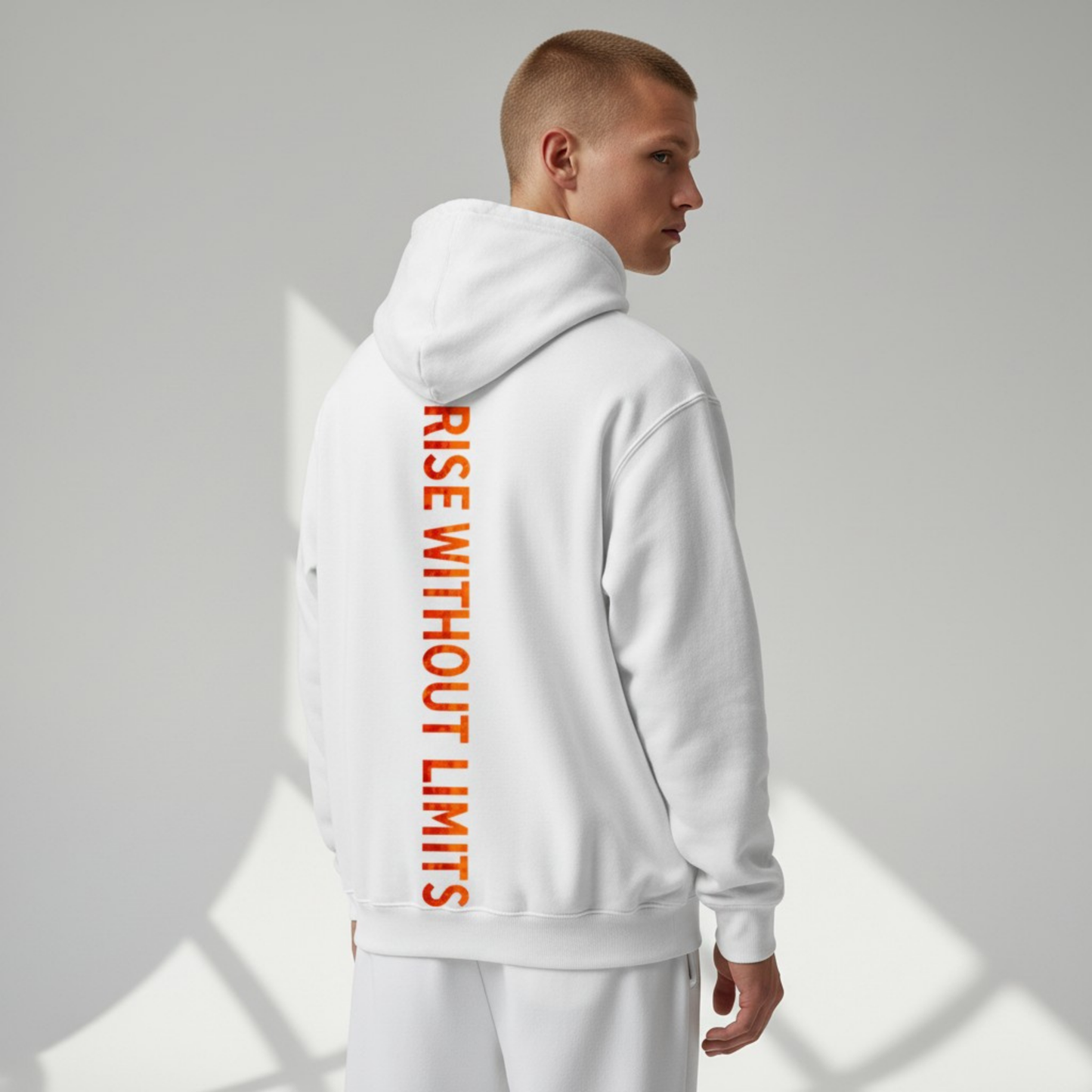 White Infinite Ascent Inferno hoodie featuring a vertical Rise Without Limits graphic on the back.