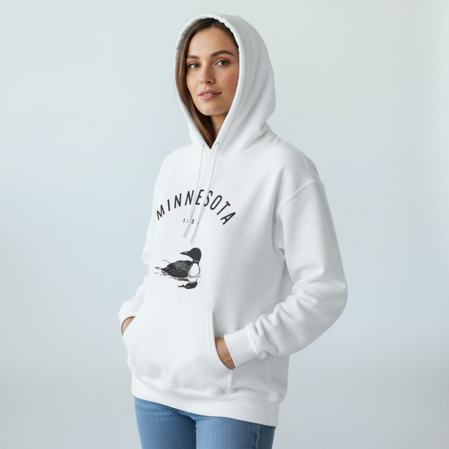 White Up North Hoodie featuring minimalist Minnesota typography and loon graphic inspired by Northwoods lake life.